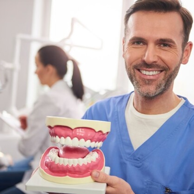 Doctor showing teeth